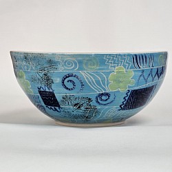 Turquoise slip bowl sgrafitto