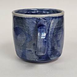 Medium blue mixture swirl mug handle forward