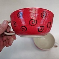 red bowl with handle